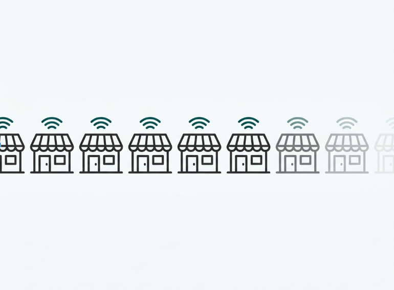 Flat illustration of a storefront icon multiplied across a row to represent hundreds of franchise branches