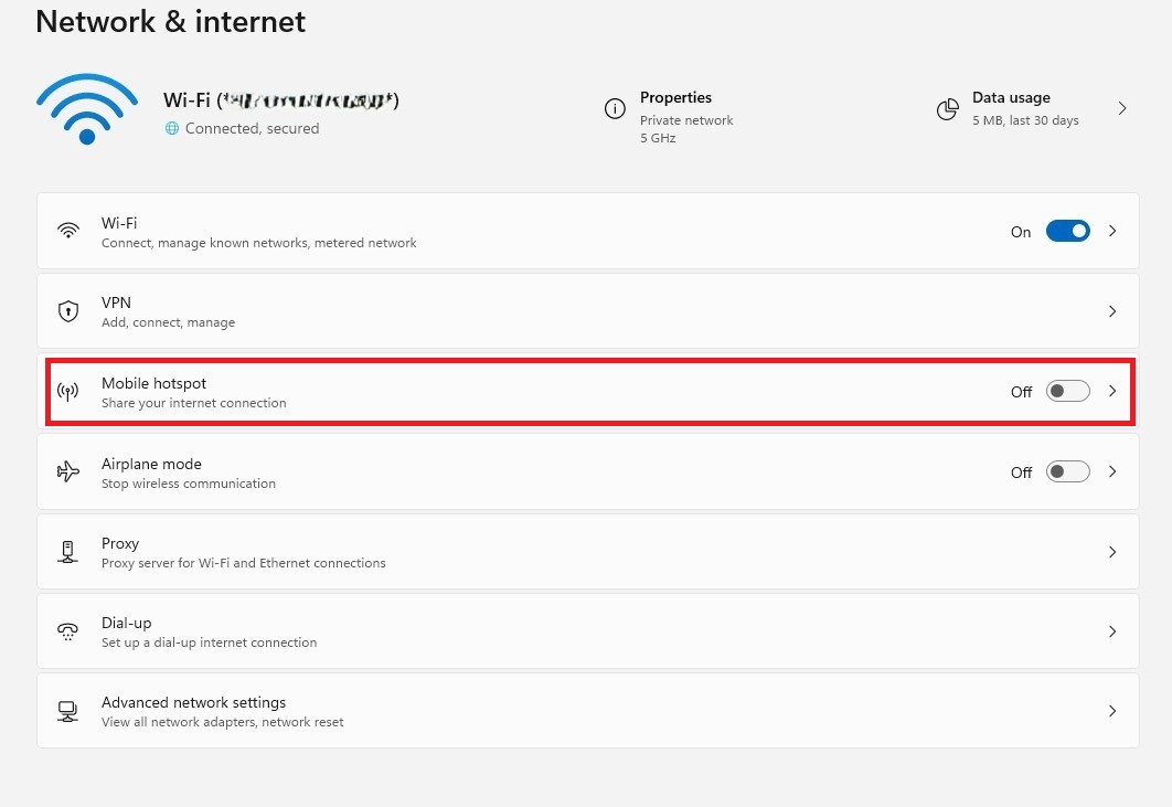 Screenshot of a Windows-based computer showing how to enable mobile hotspot after connecting it to the SSID with Wi-Fi sharing prohibition.