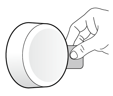 The image of removing the battery insulation tab from the button.