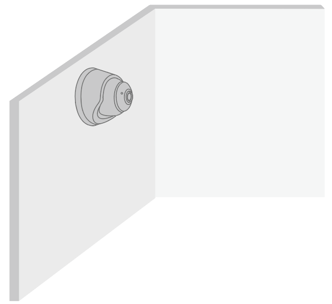 The camera is installed in an area with walls on both sides.