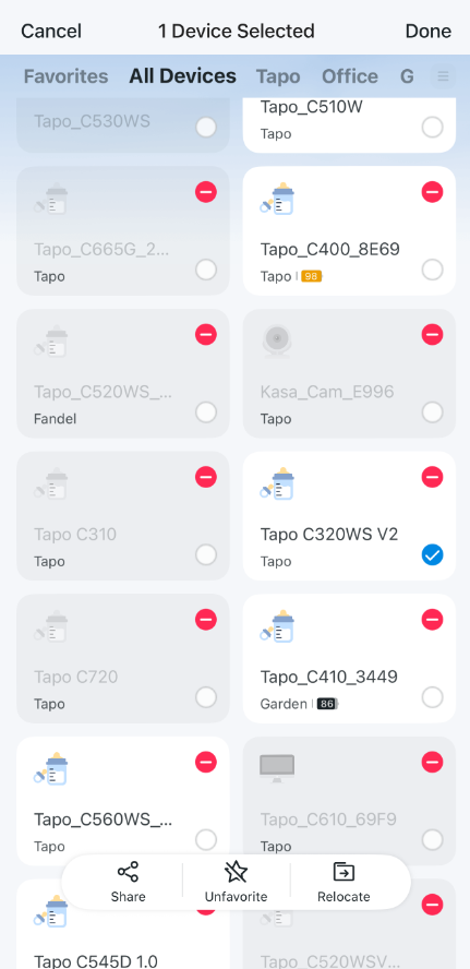 Long‑pressing the camera card, tapping the minus icon.