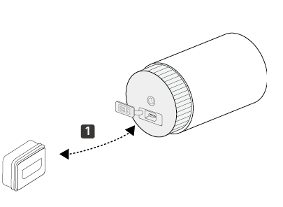 Installing the waterproof plug into the camera’s charging port.