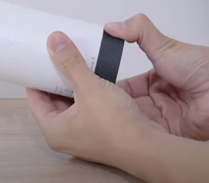 Twist the camera cover.