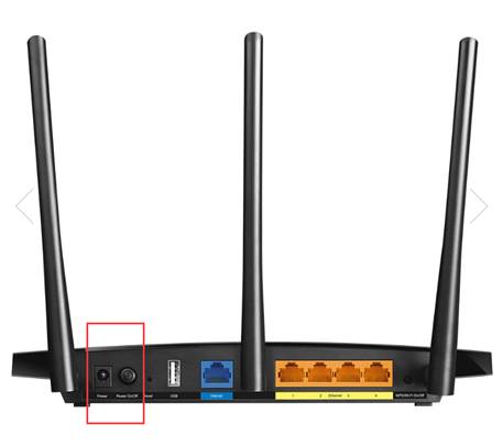 Photo of TP-Link router rear panel with power button area highlighted.