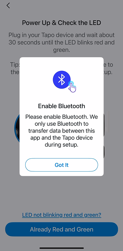Tapo app setup screen showing power up and LED check instructions with a Bluetooth pairing prompt.