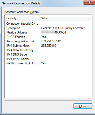 Windows IP settings showing a self-assigned IP address not within the router's network range.