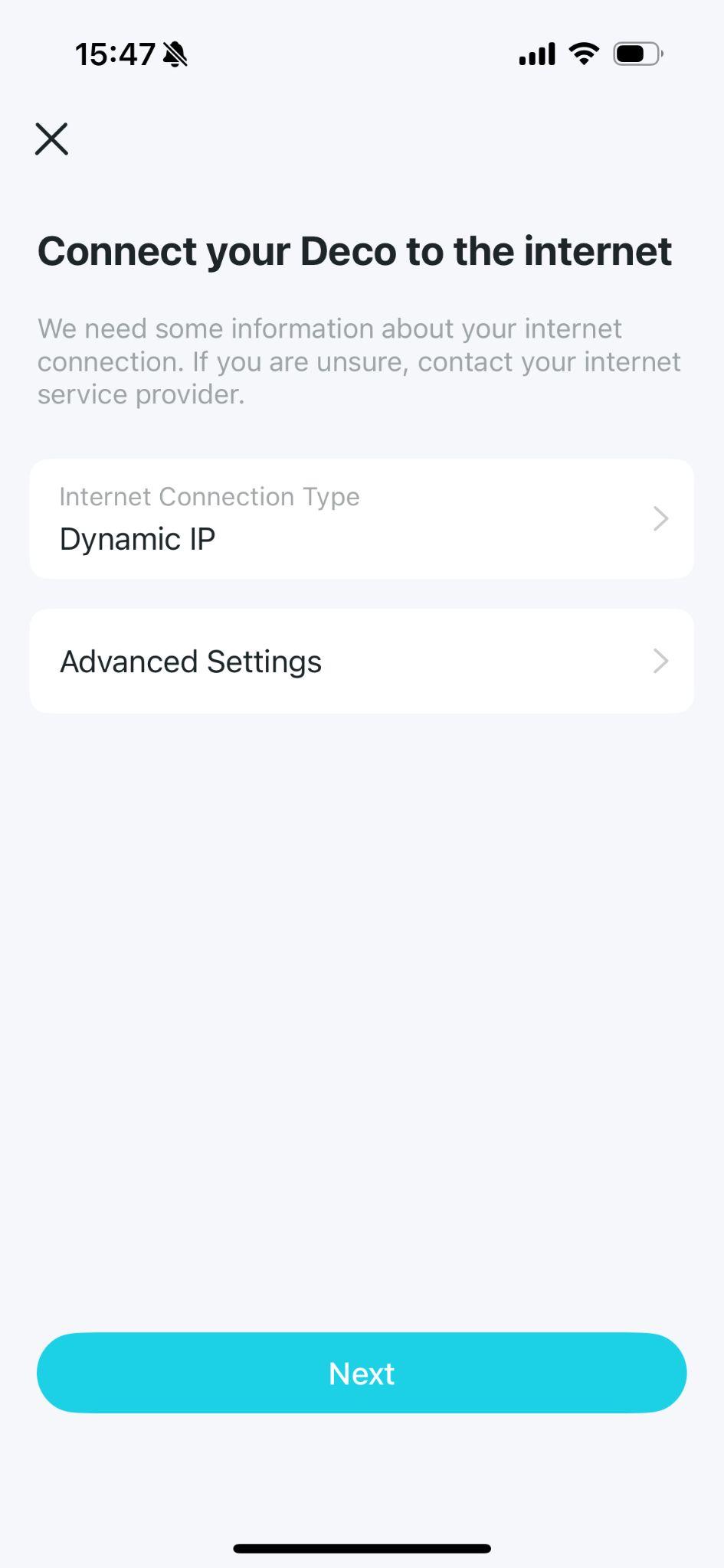 App screen showing "Connect your Deco to the internet" with Dynamic IP selected as the Internet Connection Type, an Advanced Settings option, and a Next button.