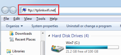 Windows File Explorer address bar showing ftp://tplinkwifi.net highlighted in a red box.