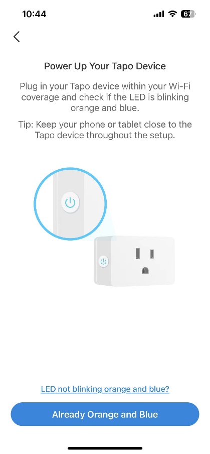 Tapo app "Power Up Your Tapo Device" screen showing a smart plug illustration with blinking LED instructions.