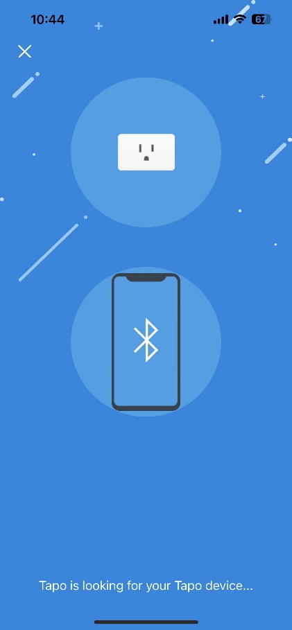 Tapo app Bluetooth discovery screen showing a smart plug and phone icon with "Tapo is looking for your Tapo device.