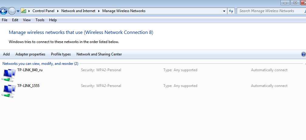 Windows 7 Manage Wireless Networks page showing two saved TP-Link networks with WPA2-Personal security.