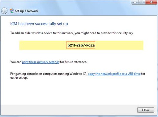 The Windows 7 Set Up a Netwwork page with the security key highlighted.