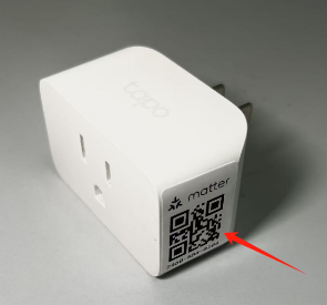 A picture showing the Matter Pairing Code located in the plug's side panel.