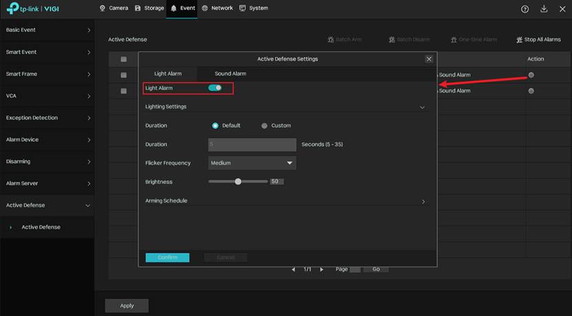 VIGI NVR Active Defense Settings window showing the Light Alarm switch enabled for a selected channel.