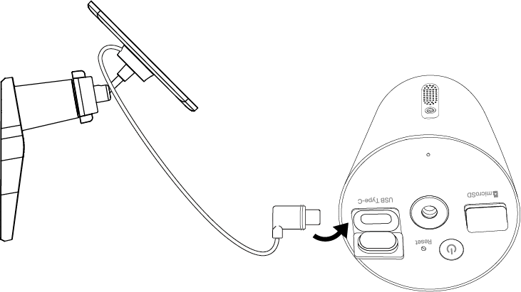 The illustration shows how to insert the solar panel connector into the camera’s charging port.