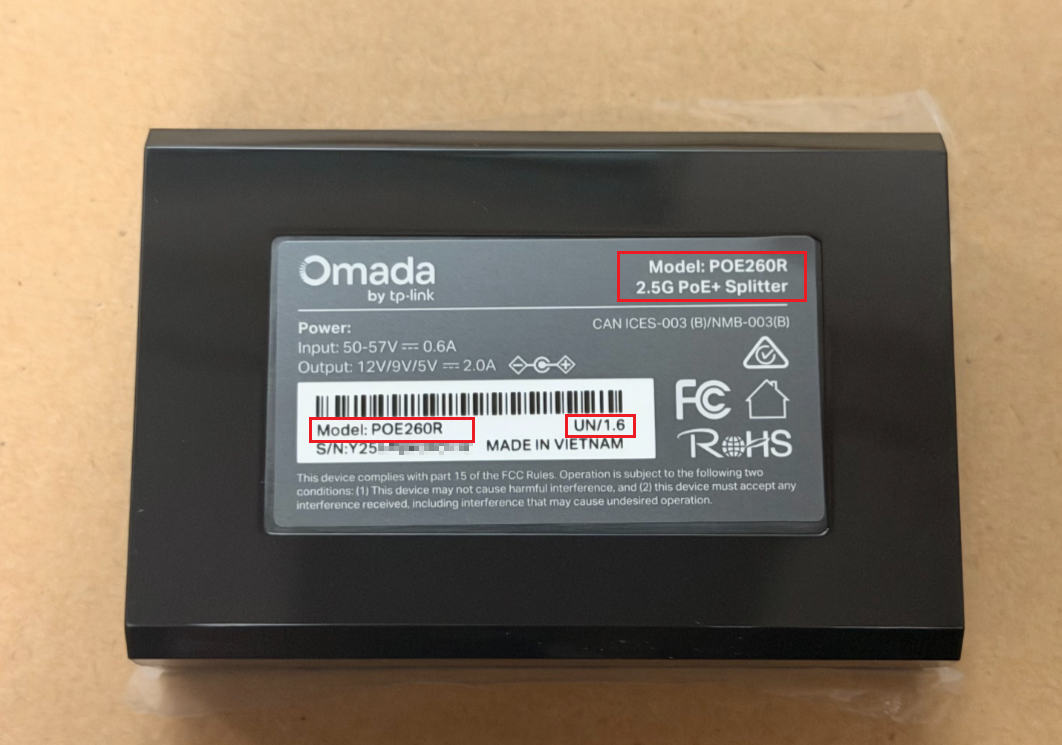 A device label with model number and hardware version highlighted