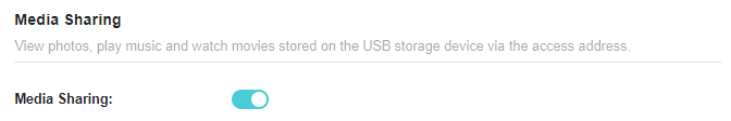 A screenshot of a router configuration page for Media Sharing settings. The page includes descriptive text explaining how to view media files stored on a USB device via an access address. A toggle switch labeled "Media Sharing:" is enabled (teal color).