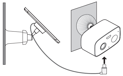 Connect the solar panel by inserting the connector into the camera charging port until snug.