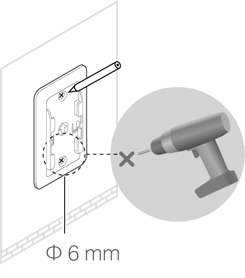 Image of marking and drilling holes on the wall